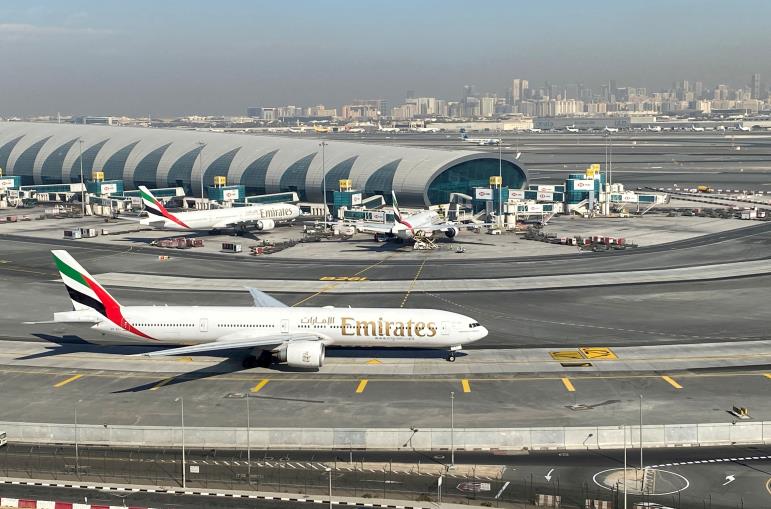 Emirates airliners are seen on the tarmac in a general view of Dubai Internatio<em></em>nal Airport in Dubai, United Arab Emirates January 13, 2021. Picture taken through a window. REUTERS/Abdel Hadi Ramahi/File Photo