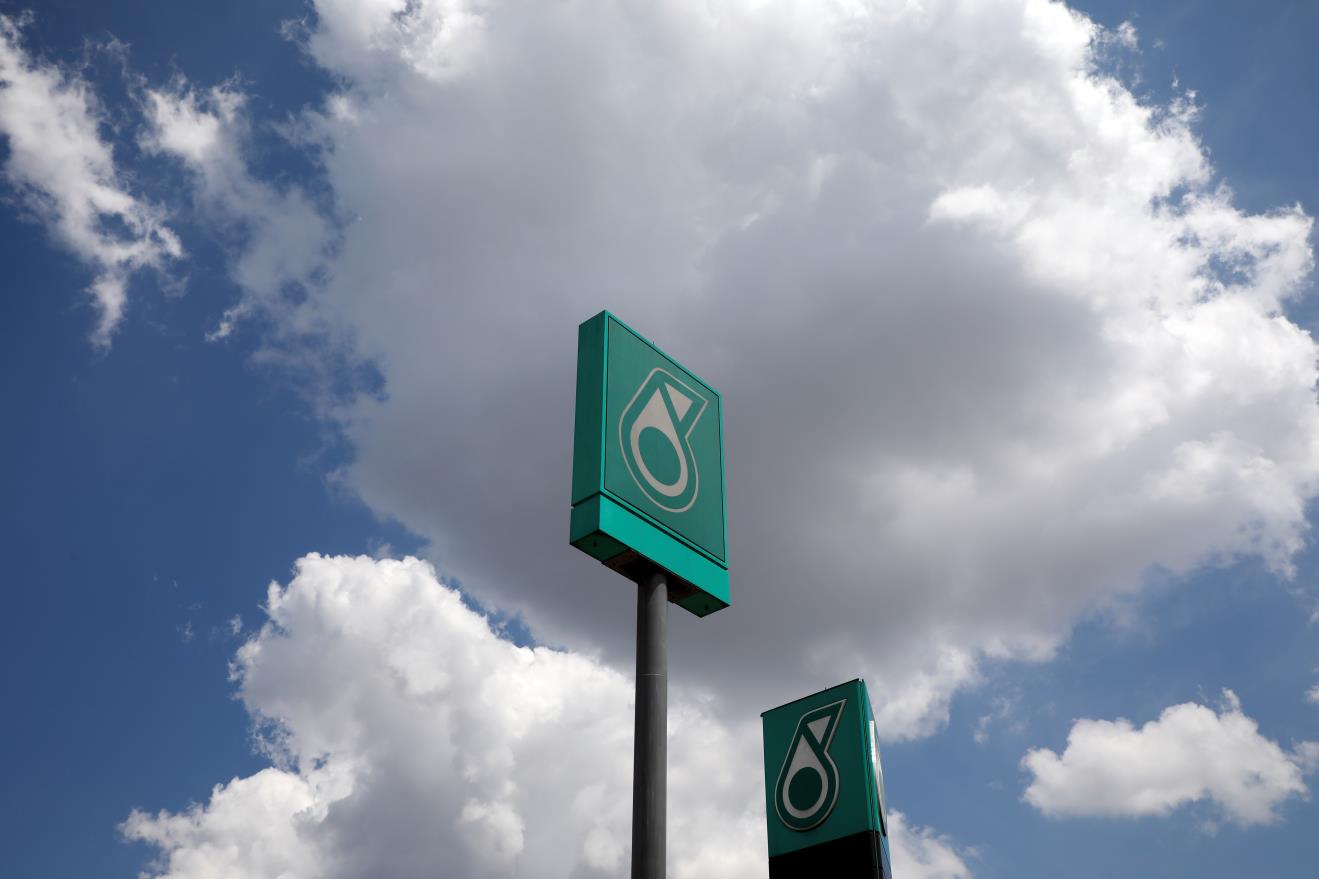 Petro<em></em>nas logos are pictured at a fuel station in Serdang, Malaysia March 4, 2021. REUTERS/Lim Huey Teng