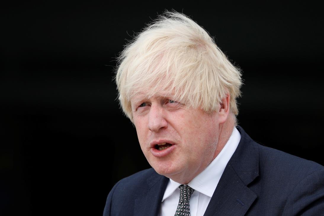 Britain's Prime Minister Boris Johnson leaves following a visit at Northwood Headquarters, the British Armed Forces Permanent Joint Headquarters, in Eastbury, northwest of London, Britain August 26, 2021.  Adrian Dennis/Pool via REUTERS