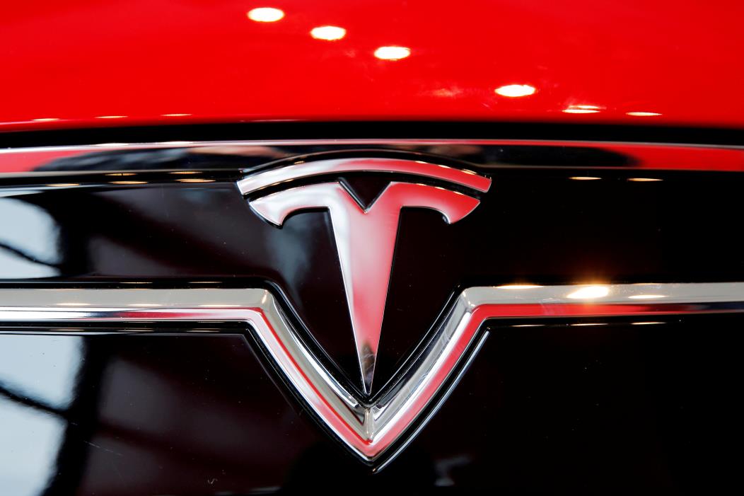 A Tesla logo on a Model S is photographed inside of a Tesla dealership in New York, U.S., April 29, 2016. REUTERS/Lucas Jackson/File Photo