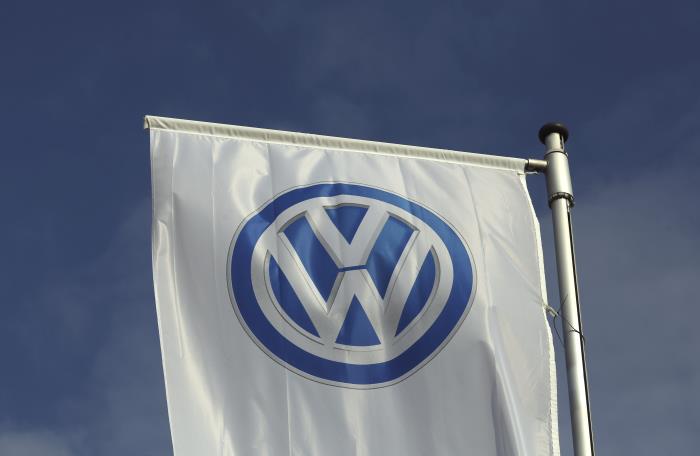 A flag of a Volkswagen VW car dealer is seen in Bochum, Germany March 16,2016.   REUTERS/Ina Fassbender