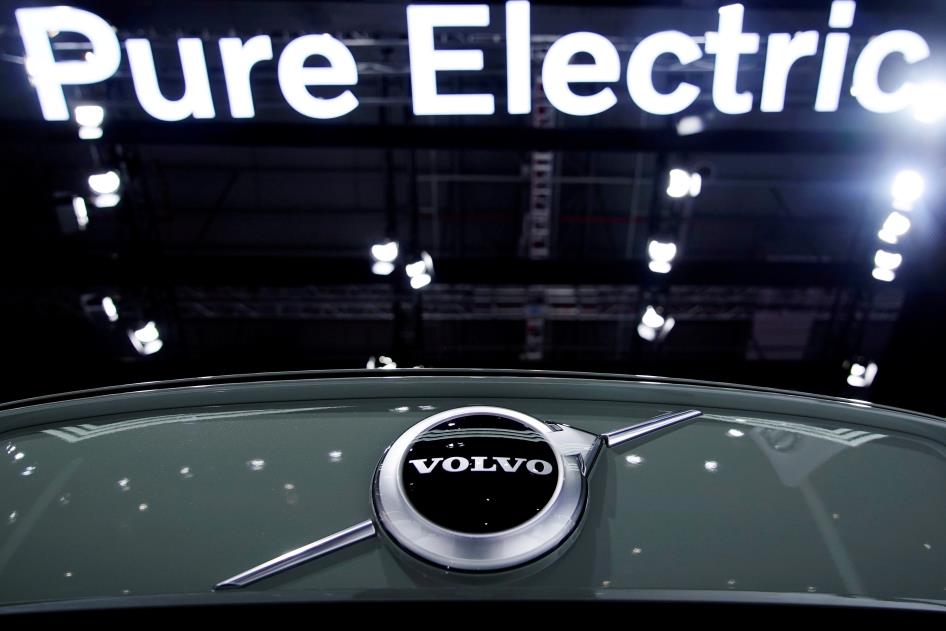 A Pure Electric sign is seen above a Volvo vehicle displayed during a media day for the Auto Shanghai show in Shanghai, China April 20, 2021. REUTERS/Aly Song//File Photo