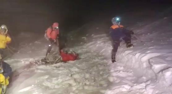 Members of Russia's Emergencies Ministry co<em></em>nduct a rescue operation after a group of climbers got stuck while climbing Mount Elbrus, in the Republic of Kabardino-Balkaria, Russia, in this still image from video taken September 23, 2021. Video taken September 23, 2021. Russia's Emergencies Ministry/Handout via REUTERS