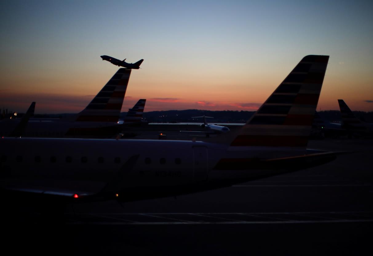 An airplane takes off from the Ro<em></em>nald Reagan Natio<em></em>nal Airport as air traffic is affected by the spread of the coro<em></em>navirus disease (COVID-19), in Washington, U.S., March 18, 2020. REUTERS/Carlos Barria