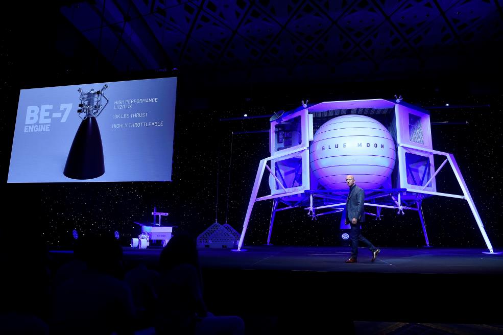 Founder, Chairman, CEO and President of Amazon Jeff Bezos unveils the BE-7 rocket engine that his space company Blue Origin's space exploration lunar lander rocket called Blue Moon will use during an unveiling event in Washington, U.S., May 9, 2019. REUTERS/Clodagh Kilcoyne