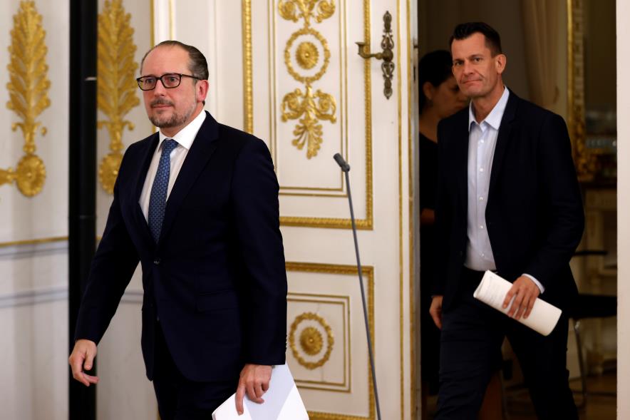 Austrian Chancellor Alexander Schallenberg and Health Minister Wolfgang Mueckstein arrive to a news co<em></em>nference in Vienna, Austria November 5, 2021. REUTERS/ Leo<em></em>nhard Foeger