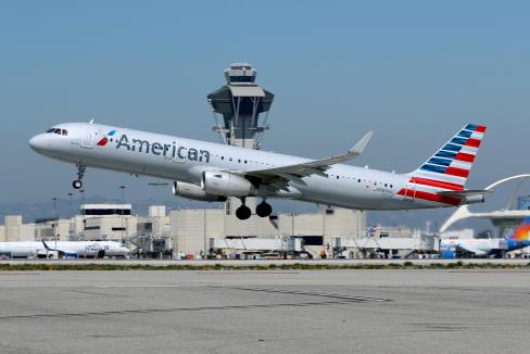 An American Airlines Airbus A321-200 plane takes off from Los Angeles Internatio<em></em>nal airport (LAX) in Los Angeles, California, U.S. March 28, 2018. REUTERS/Mike Blake/File Photo