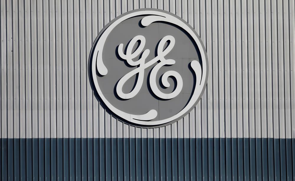 The logo of U.S. co<em></em>nglomerate General Electric is pictured at the site of the company's energy branch in Belfort, France, February 5, 2019. REUTERS/Vincent Kessler/File Photo