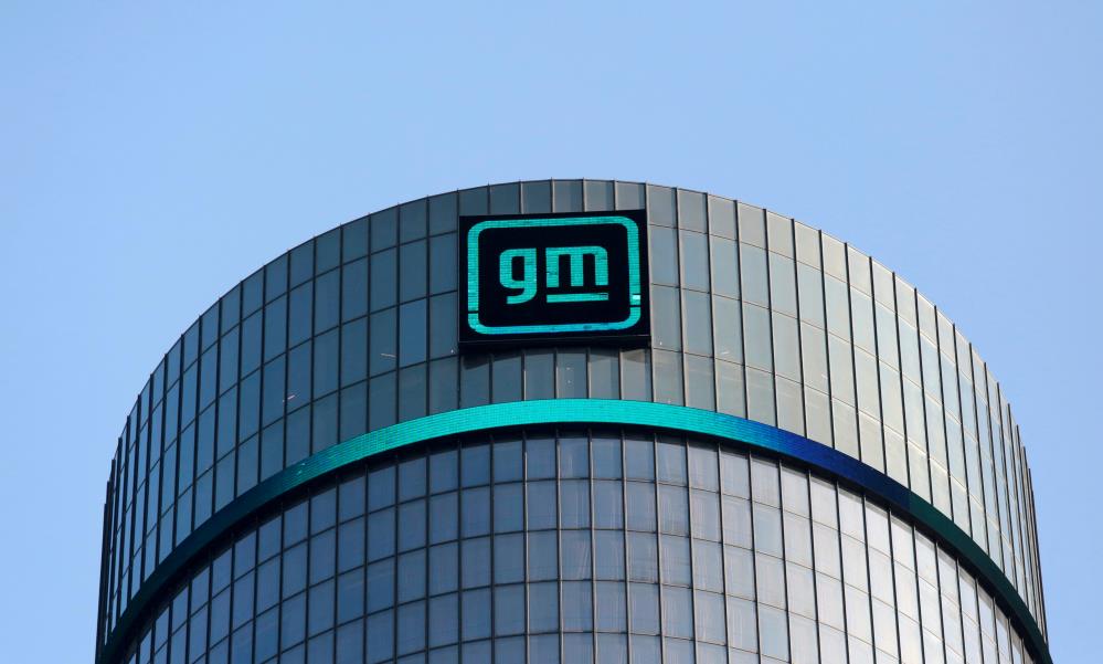 The new GM logo is seen on the facade of the General Motors headquarters in Detroit, Michigan, U.S., March 16, 2021. REUTERS/Rebecca Cook