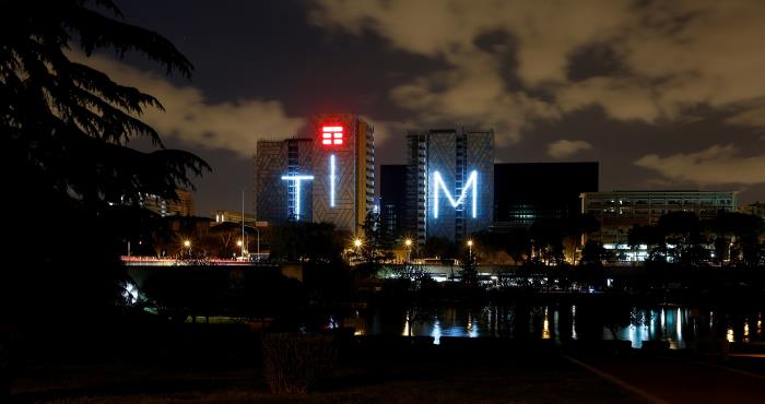 Telecom Italia's logo for the TIM brand is seen on a building in Rome, Italy, April 9, 2016. REUTERS/Alessandro Bianchi/File Photo