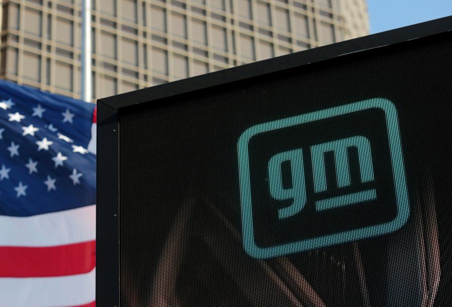 The new GM logo is seen on the facade of the General Motors headquarters in Detroit, Michigan, U.S., March 16, 2021.  REUTERS/Rebecca Cook/File Photo