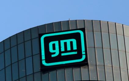 The new GM logo is seen on the facade of the General Motors headquarters in Detroit, Michigan, March 16, 2021. REUTERS/Rebecca Cook