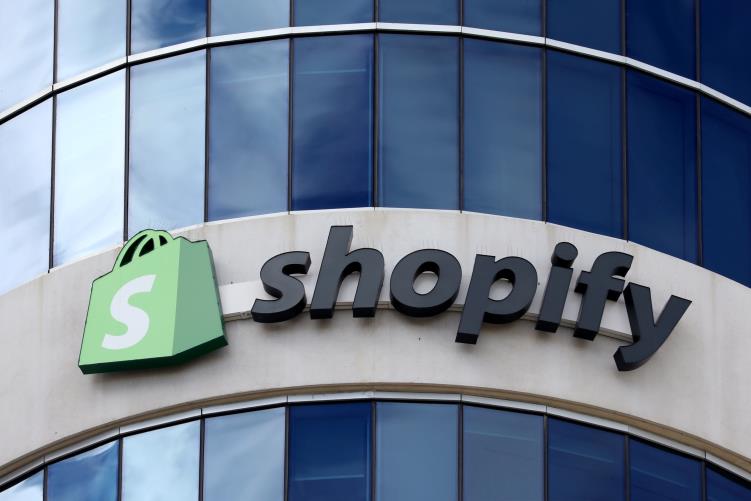 The logo of Shopify is seen outside its headquarters in Ottawa, Ontario, Canada, September 28, 2018. REUTERS/Chris Wattie/File Photo  