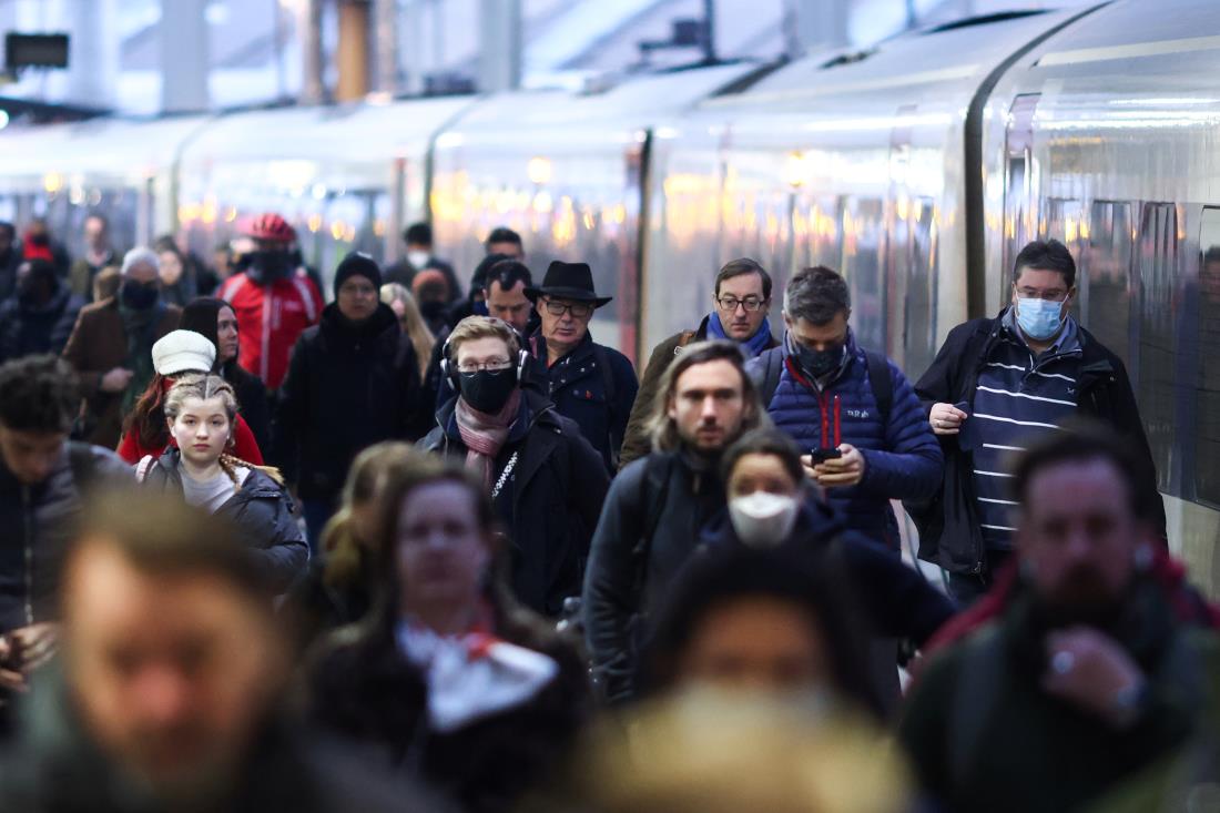 Commuters walk at the Waterloo station during a tube strike, in London, Britain, November 26, 2021. REUTERS/Tom Nicholson