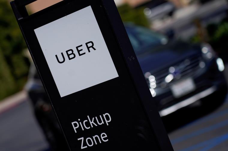 An Uber pick-up location is pictured in San Diego, California, September 30, 2019. REUTERS/Mike Blake/File Photo