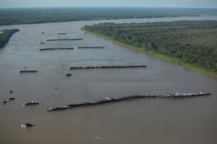 An aerial view shows hundreds of dredging rafts operated by illegal miners who have gathered in a gold rush on the Madeira, a major tributary of the Amazon river, in Autazes, Amazo<em></em>nas state, Brazil November 23, 2021. REUTERS/Bruno Kelly