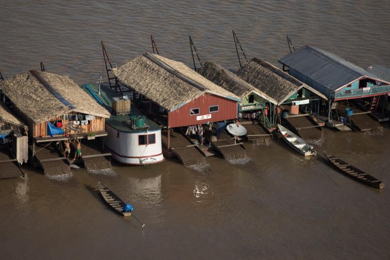 An aerial view shows hundreds of dredging rafts operated by illegal miners who have gathered in a gold rush on the Madeira, a major tributary of the Amazon river, in Autazes, Amazo<em></em>nas state, Brazil November 23, 2021.   REUTERS/Bruno Kelly