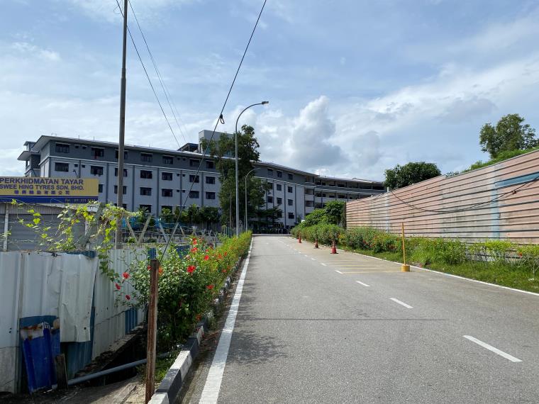 A five-storey workers' hostel owned by ATA IMS Bhd is seen in Johor Bahru, Johor state, Malaysia, November 28, 2021. Picture taken November 28, 2021.  REUTERS/Liz Lee