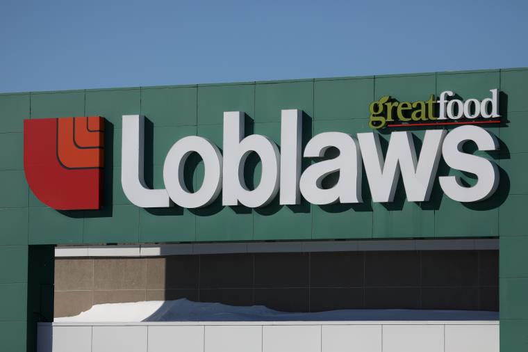 A Loblaw logo is seen outside a grocery store in Ottawa, Ontario, Canada, February 14, 2019. REUTERS/Chris Wattie/File Photo