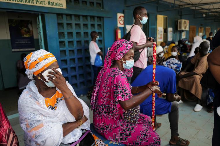 People wait to receive a dose of coro<em></em>navirus disease (COVID-19) vaccine at  Philippe Senghor Hospital  in Dakar.
REUTERS/Zohra Bensemra 