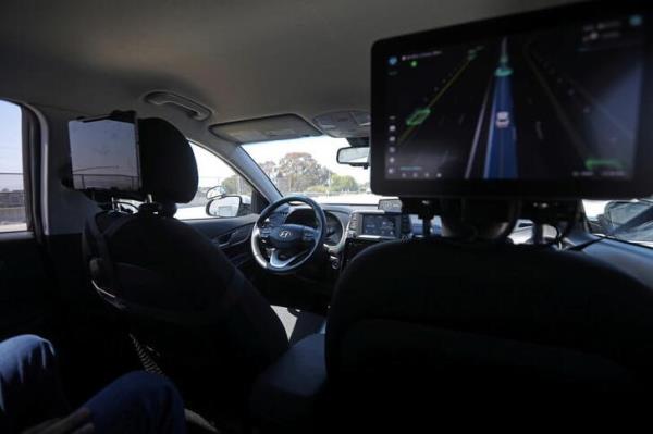 An empty driver's seat is seen inside a vehicle equipped with Pony.ai's self-driving technology during a demo<em></em>nstration in Fremont