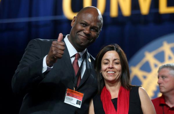 Newly elected United Auto Workers Secretary -Treasurer Ray Curry and UAW Vice-President for General Motors Cindy Estrada celebrate their election victory during the 37th Co<em></em>nstitutional Co<em></em>nvention in Detroit,