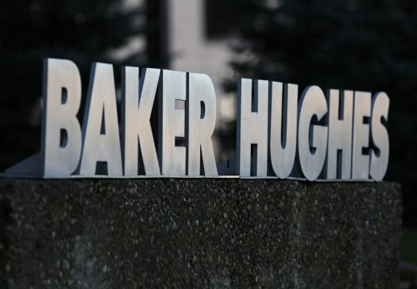 A Baker Hughes sign is displayed outside the oil logistics company's local office in Sherwood Park