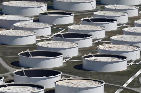 Crude oil storage tanks are seen from above at the Cushing oil hub in Cushing