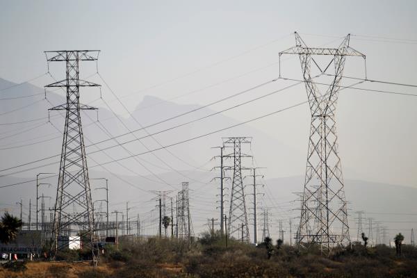 General view shows high voltage power lines owned by Mexico's state-run electric utility known as the CFE, in Santa Catarina