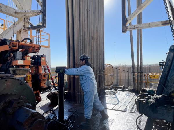 A rig hand works on an electric drilling rig for oil producer Civitas Resources, at the Denver suburbs, in Broomfield