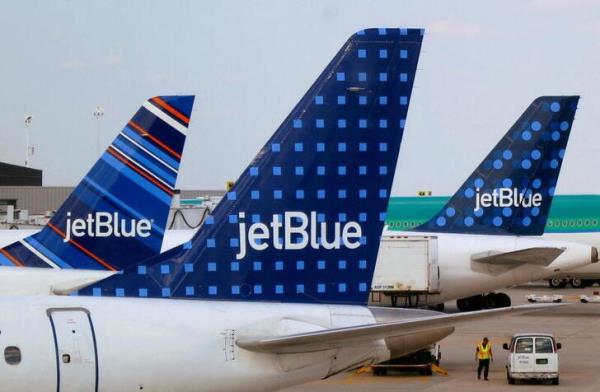 JetBlue Airways aircrafts are pictured at departure gates at John F. Kennedy Internatio<em></em>nal Airport in New York