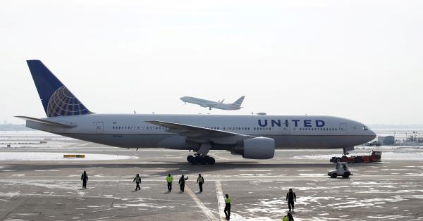 A United Airlines Boeing 777 plane is towed at O'Hare Internatio<em></em>nal Airport in Chicago