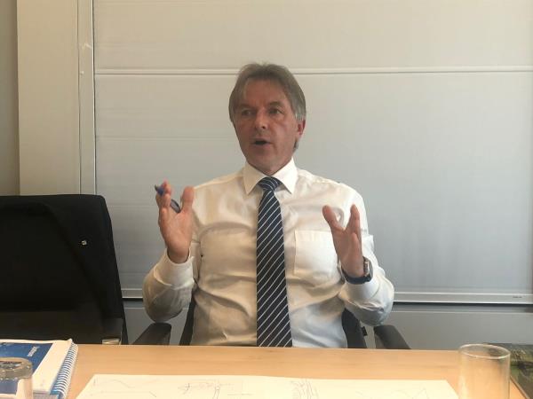 OMV executive board member Johann Pleininger gestures during an interview with Reuters in Vienna