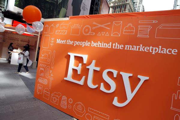 A sign advertising the o<em></em>nline seller Etsy Inc. is seen outside the Nasdaq market site in Times Square following Etsy's IPO in New York