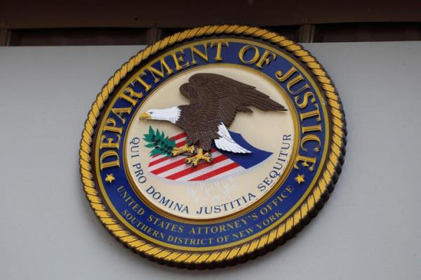 The seal of the United States Department of Justice is seen on the building exterior of the United States Attorney's Office of the Southern District of New York in Manhattan, New York City