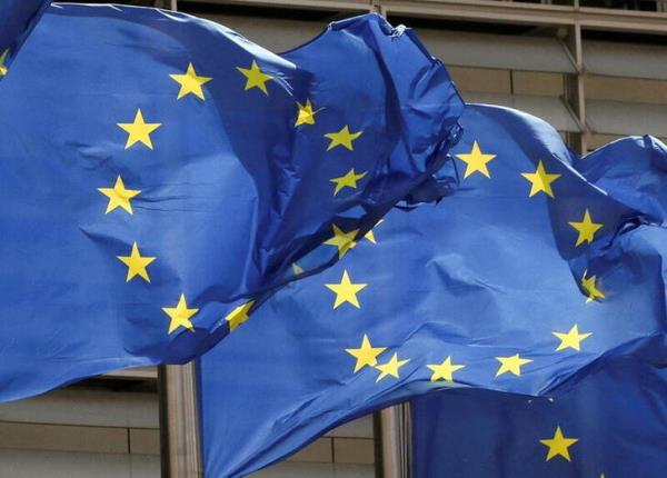 European Unio<em></em>n flags flutter outside the EU Commission headquarters in Brussels