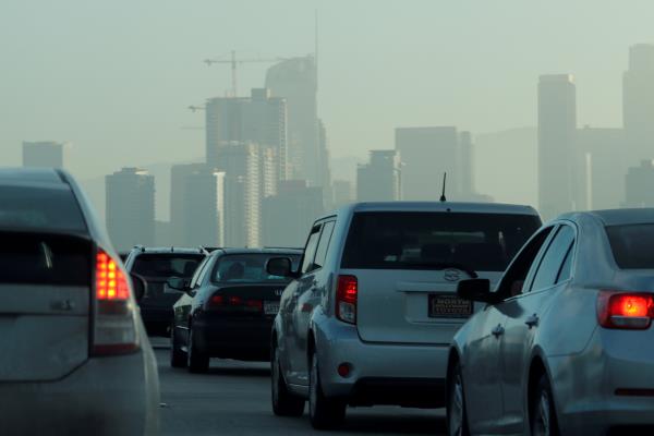 FILE PHOTO: Commuters navigate early morning traffic as they drive towards downtown in Los Angeles, California