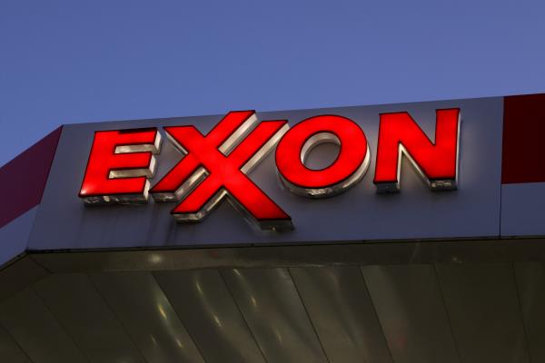 Signage is seen at an Exxon gas station in Brooklyn, New York City