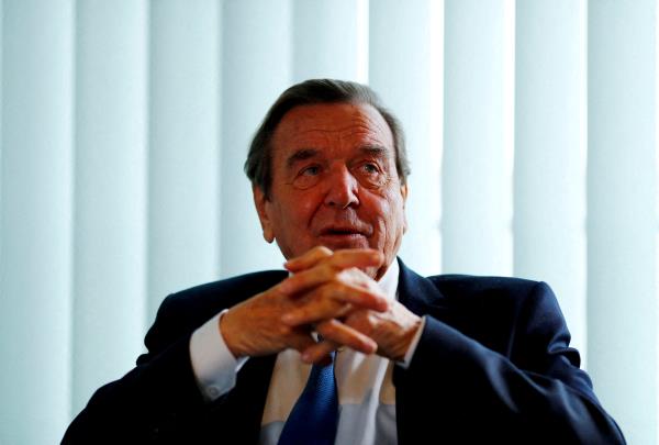 Former German Chancellor Gerhard Schroeder is pictured during an interview with Reuters in his office in Berlin