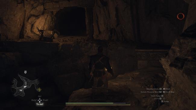 Player Arisen standing in front of a pathway they need to jump across lit by lamps in Drabnir's Grotto in Dragon's Dogma 2.