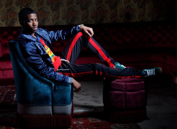 Christian Combs sitting on a stool at the Ragtrader, New York, in February 2018, photographed by Tamara Beckwith for NY Post