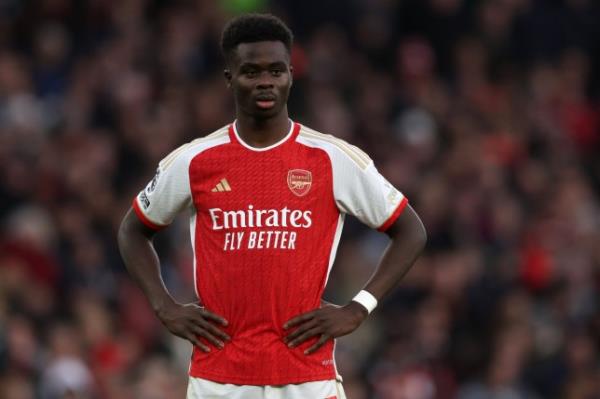 Bukayo Saka of Arsenal in action during the Premier League match between Arsenal FC and Brighton & Hove Albion at Emirates Stadium on December 17, 2023 in London, England. (Photo by Richard Heathcote/Getty Images)