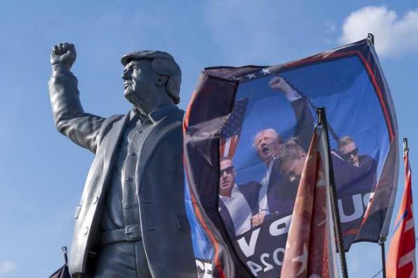 A&#x20;statue&#x20;of&#x20;Republican&#x20;presidential&#x20;nominee&#x20;former&#x20;President&#x20;Donald&#x20;Trump&#x20;is&#x20;set&#x20;up&#x20;on&#x20;a&#x20;truck&#x20;ahead&#x20;of&#x20;a&#x20;campaign&#x20;event&#x20;at&#x20;the&#x20;Butler&#x20;Farm&#x20;Show,&#x20;Friday,&#x20;Oct.&#x20;4,&#x20;2024,&#x20;in&#x20;Butler,&#x20;Pa.&#x20;&#x28;AP&#x20;Photo&#x2F;Alex&#x20;Brandon&#x29;