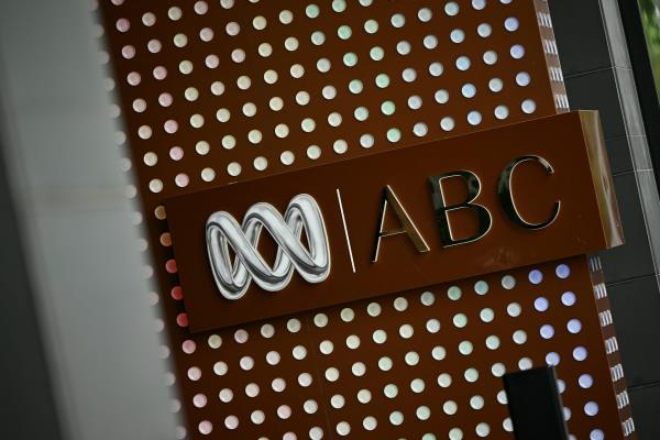 A multicolour light-up sign saying ABC