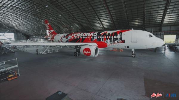 Another livery has 'Persona' characters on the side of the plane. — Picture from AirAsia