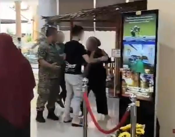 One video showed an Arabic-speaking woman engaging in a shouting match with a soldier after knocking over furniture. — Picture via X/@Cool_Wannabe82