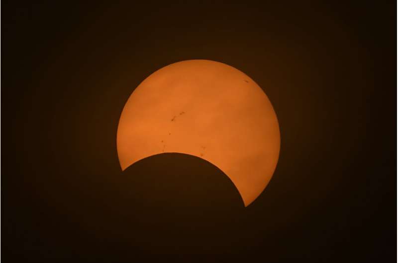 The eclipse starts off looking like a 'bite' has been taken out of the Sun