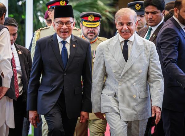 Prime Minister Datuk Seri Anwar Ibrahim and his Pakistani counterpart Shehbaz Sharif in co<em></em>njunction with the state visit at the Pakistan Prime Minister Official Residence in Islamabad October 3, 2024. — Bernama pic