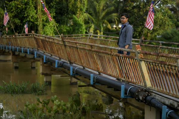 Authorities are still searching for Sabari Baharom, a 62-year-old retired Felcra officer from Baling, Kedah, who disappeared early September. — Bernama pic