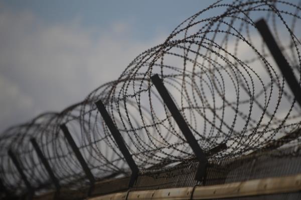 A barbed wire fence at a military check point co<em></em>nnecting South and North Korea at the Unification Bridge in Paju, Gyeo<em></em>nggi Province in South Korea. (GettyImages)